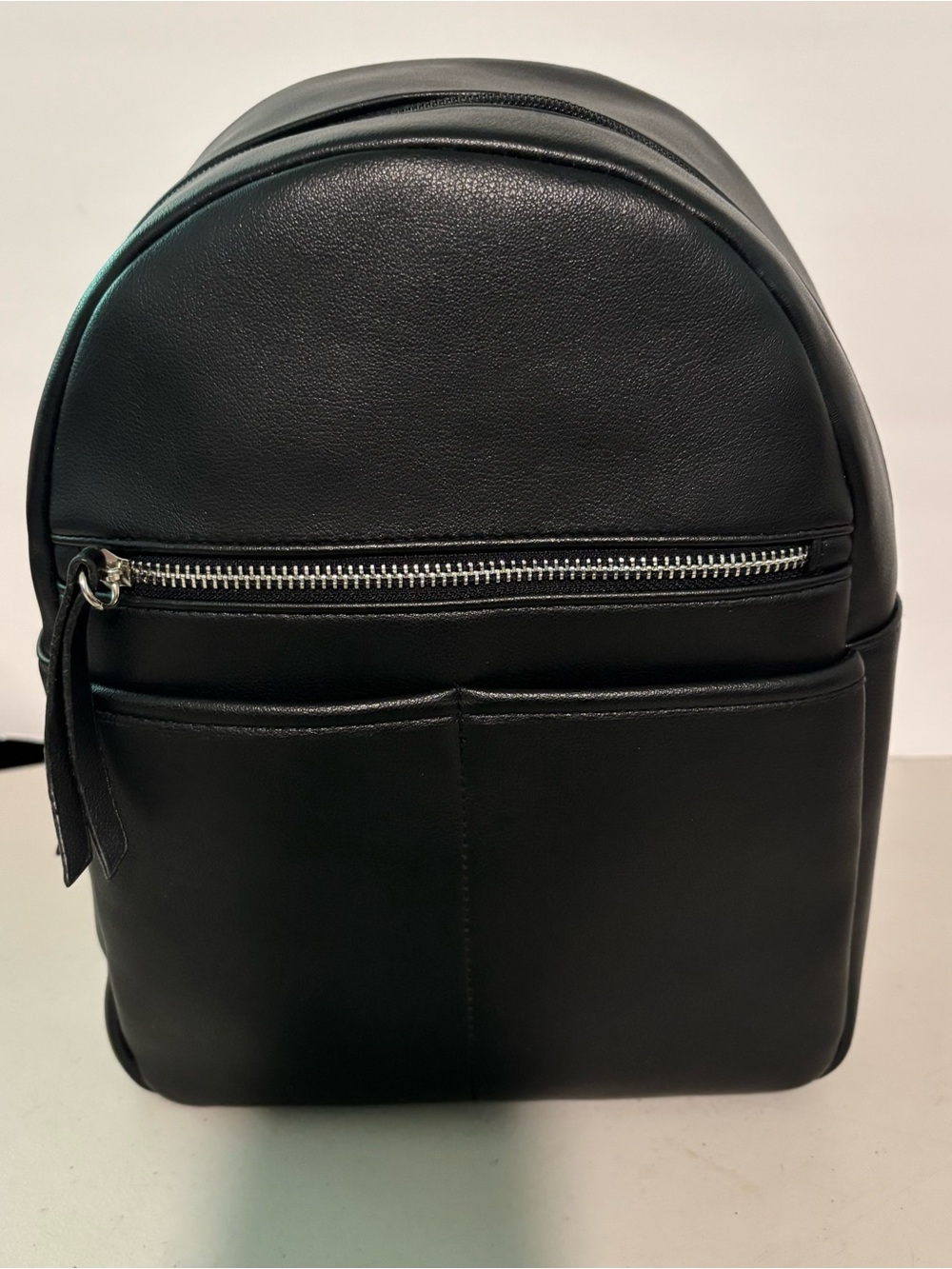 Black faux backpack. New